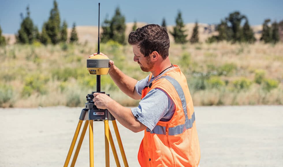 Alaskan Surveyor using a GNSS Surveying System