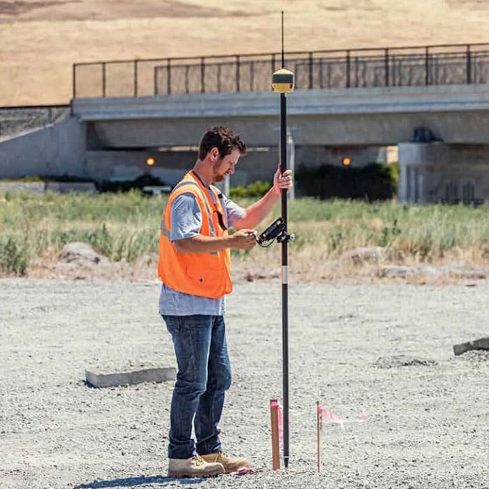 Construction worker using a HiPer HR GNSS Receiver