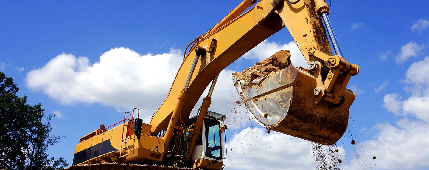 Excavator at work using the iDig Grade Control System