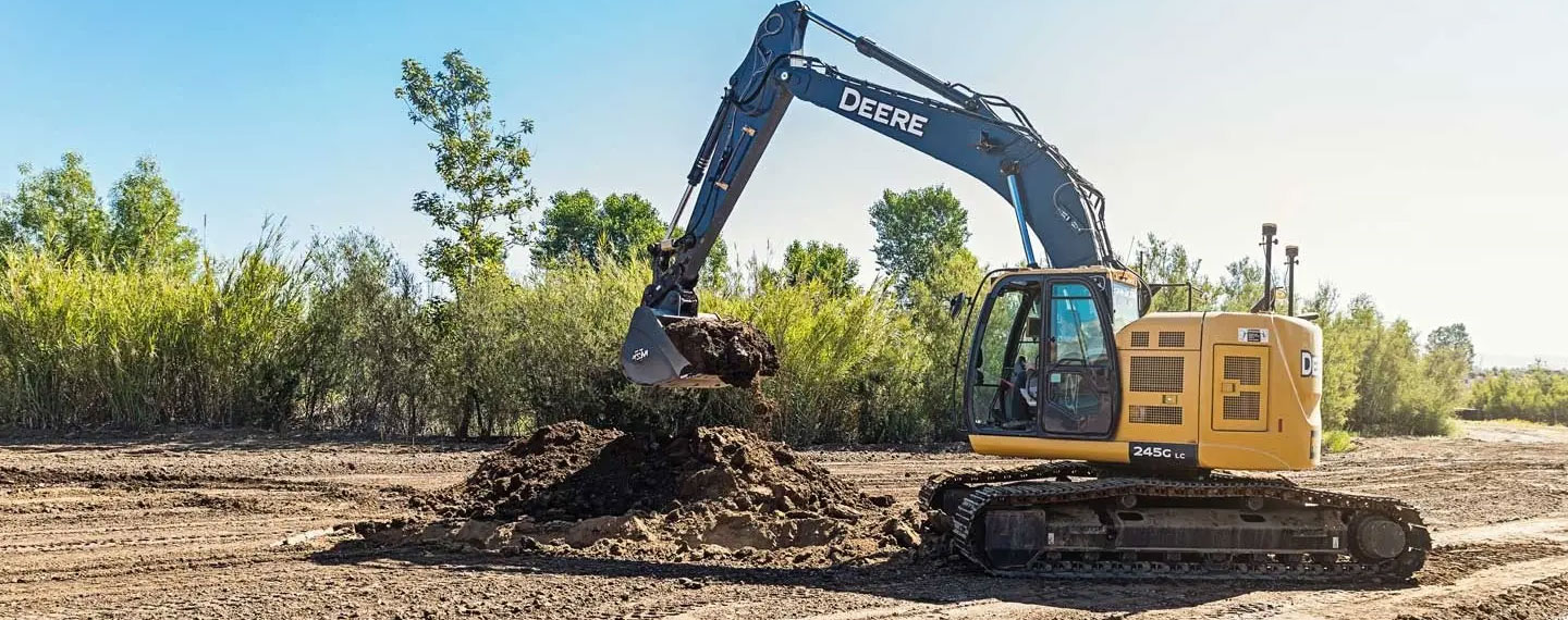 Excavator on job site assisted by the MC-Max Excavator