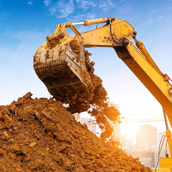 The MC-X Platform Machine Control System guides an excavator on a job site