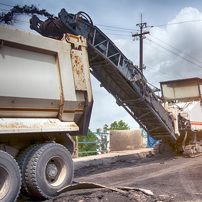 Road resurfacing equipment at work using a 3D Milling System 