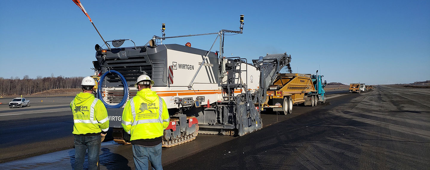 GPS Alaska staff at work on a road paving site.