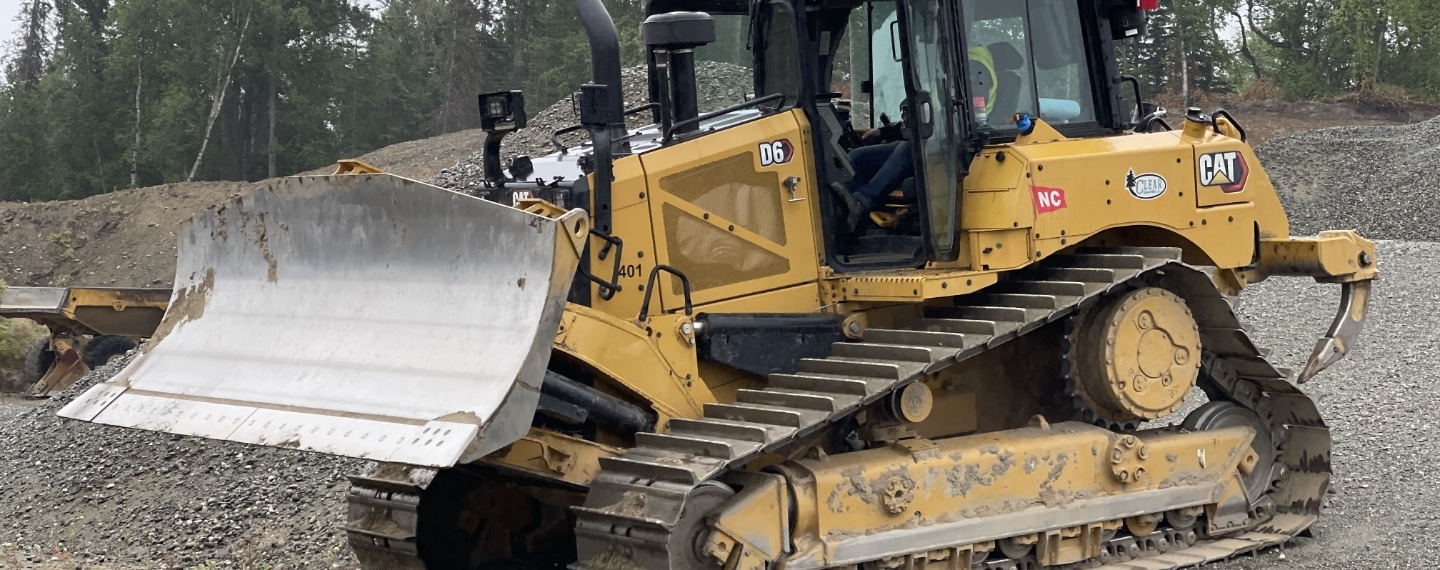 GPS Alaska job site with construction equipment